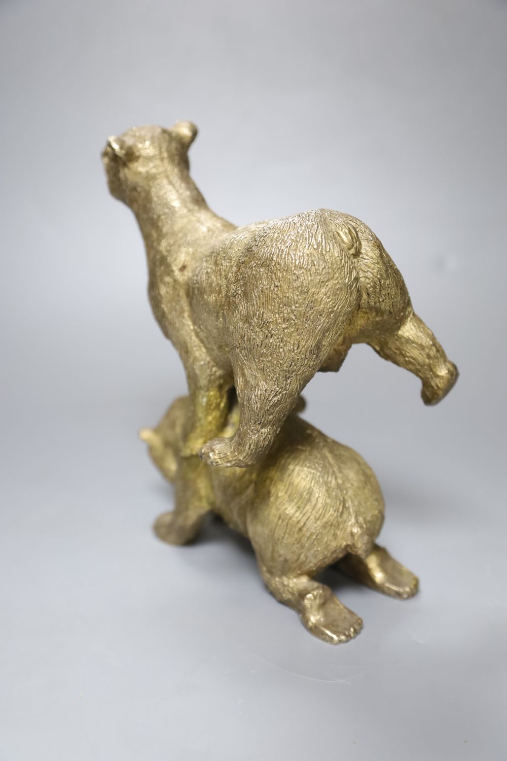 A silvered bronze group of two playful bears, height 20cm